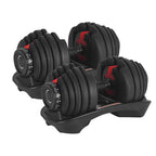 Pair of adjustable dumbbells on a white background