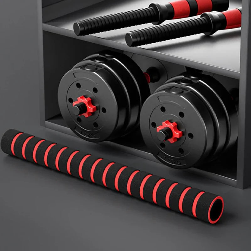 Black and red dumbbells on a gray surface with a dark background
