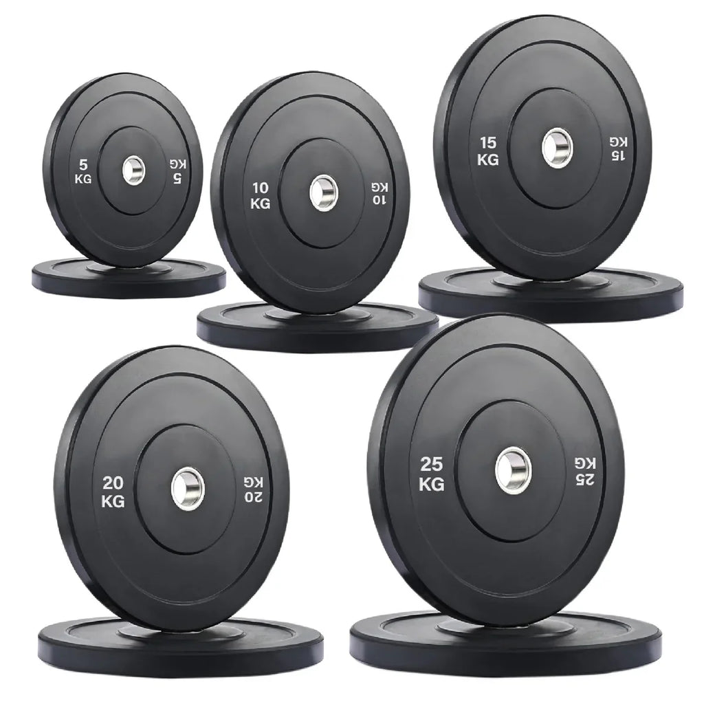 Set of weight plates with labeled weights on a white background
