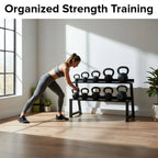 Woman exercising with kettlebells in a home gym setting