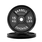 Black barbell weight plate with measurements on a white background