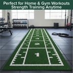 Green sports-themed mat with white markings in a gym setting