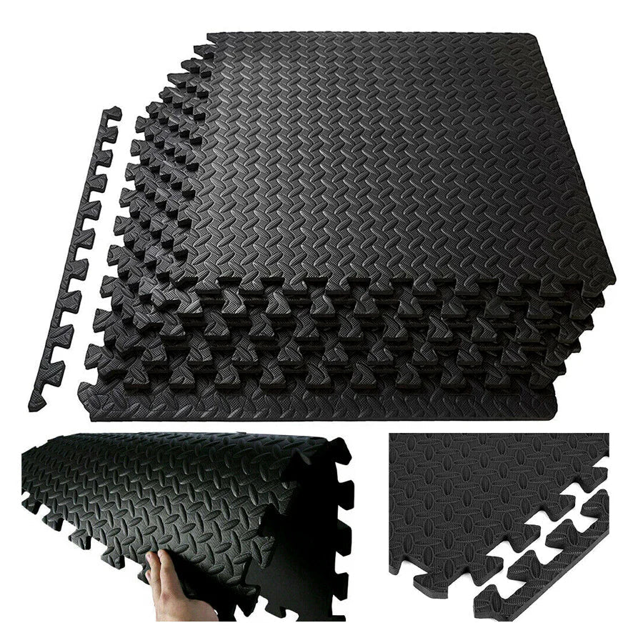 Black foam puzzle mats with interlocking design on a white background