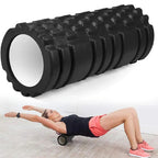 Black foam roller with textured surface and a person using it for exercise on a light background