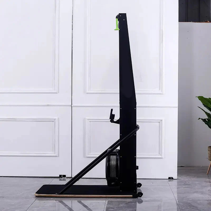 Black exercise bike against a white paneled wall