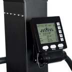 Digital display on a piece of exercise equipment with buttons and screen.