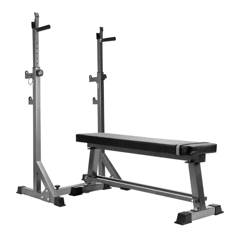Black weight bench with squat rack on a white background