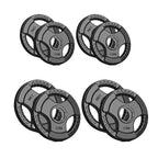 Set of four weight plates with '15KG' marking on a white background