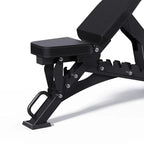 Black adjustable weight bench on a white background