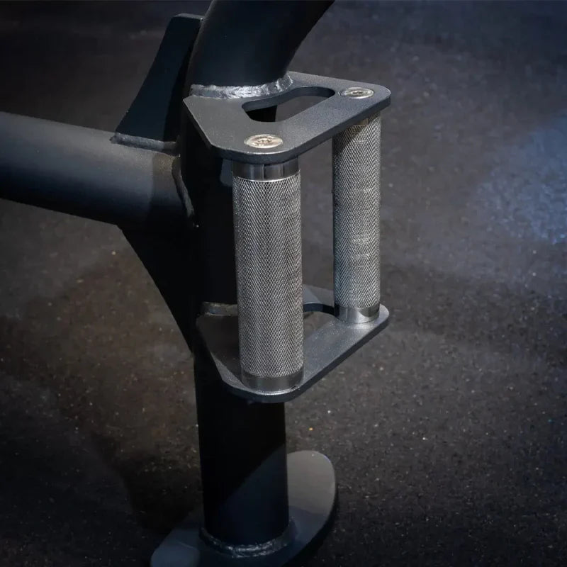 Close-up of a metal grip on a dark background