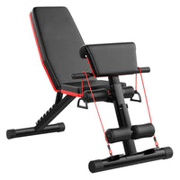 Black adjustable weight bench with red accents on a white background