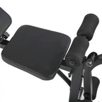 Black exercise device with seat and handles on a white background
