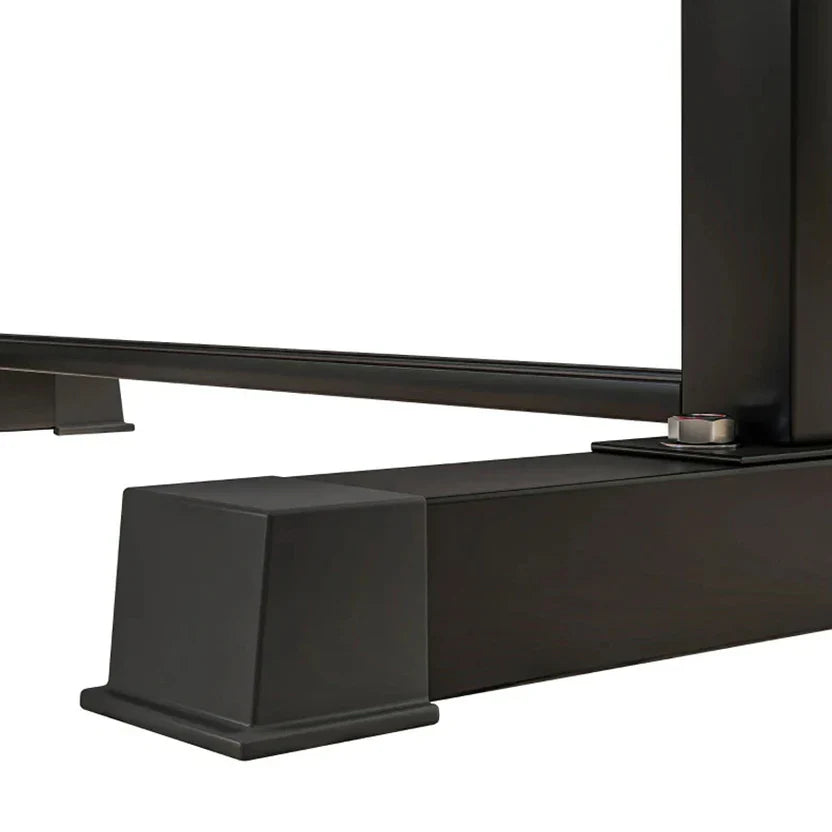 Close-up of a black metal bracket on a white background