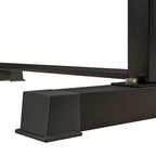 Close-up of a black metal bracket on a white background